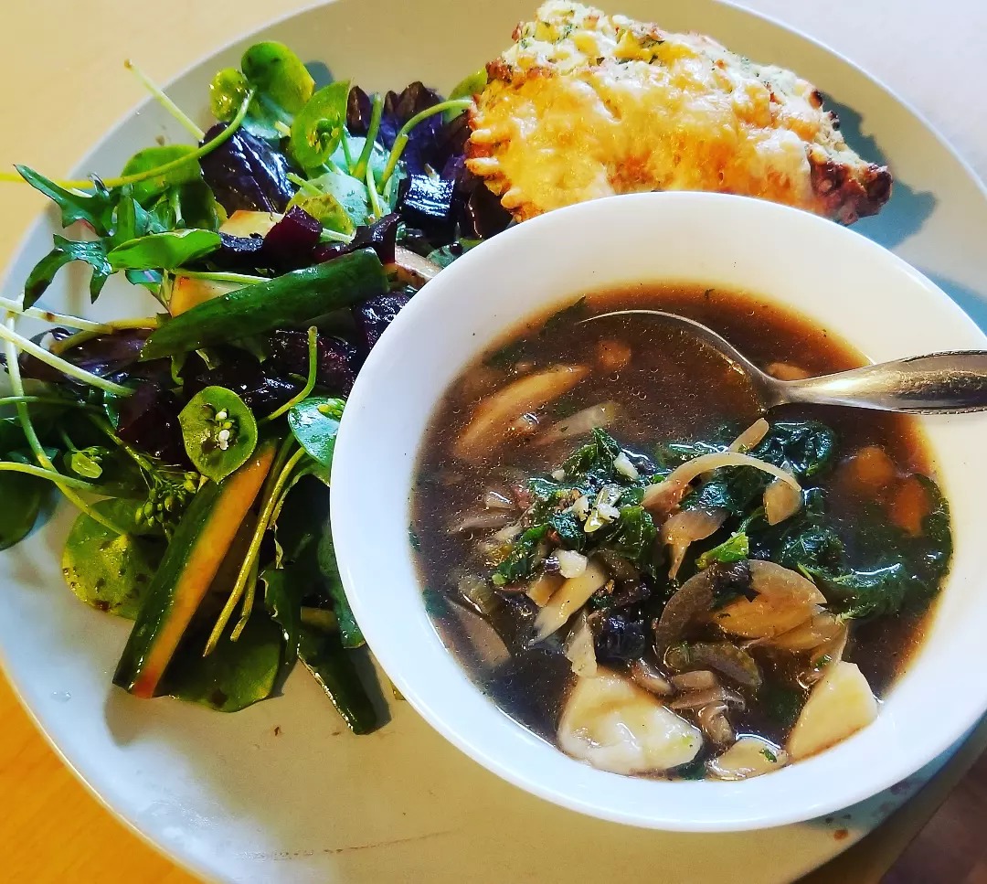 Spring soup with foraged morels and nettles, local salad, and spinach feta scone